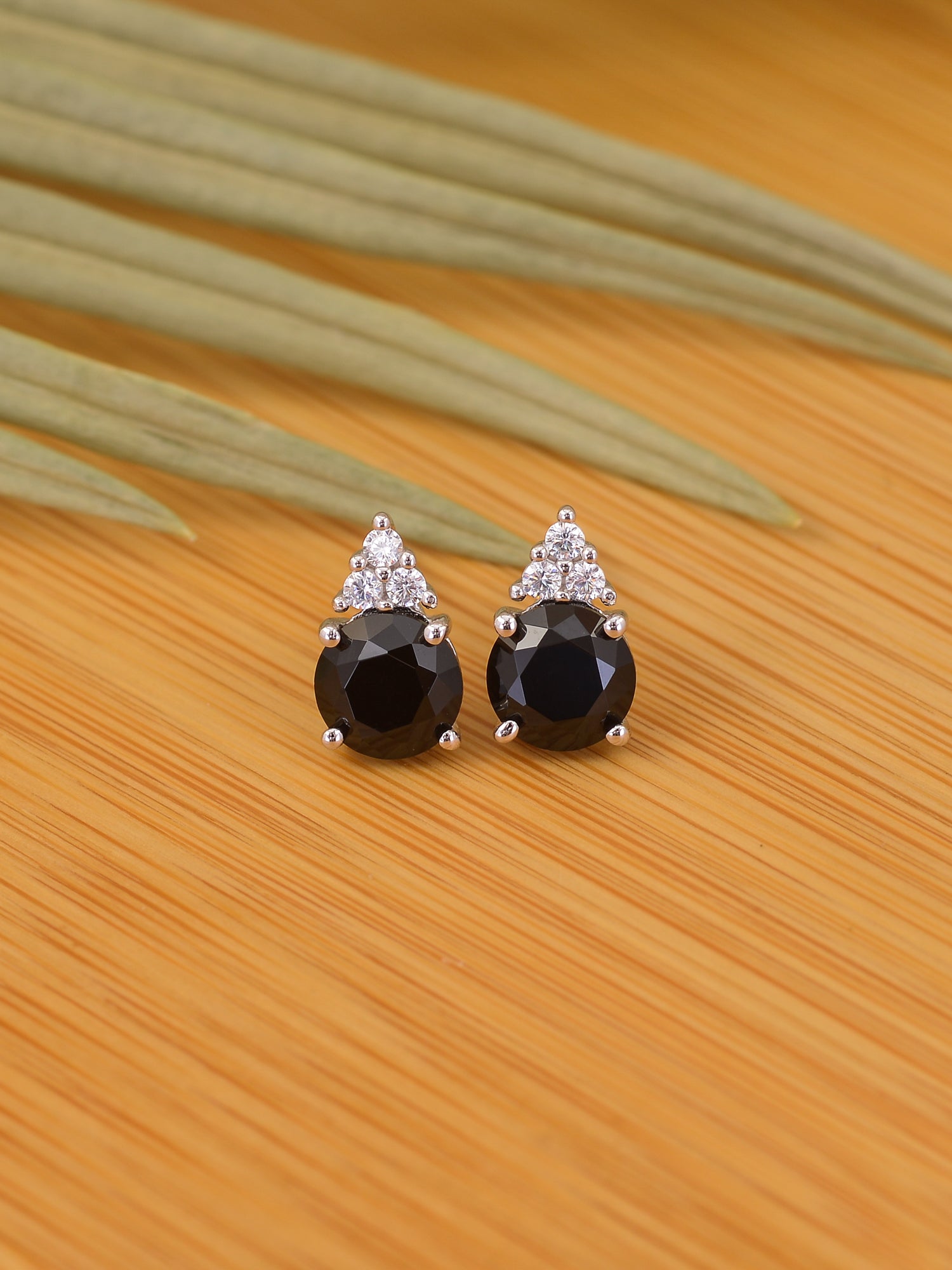 BLACK SOLITAIRE STUDS IN 925 STERLING SILVER
