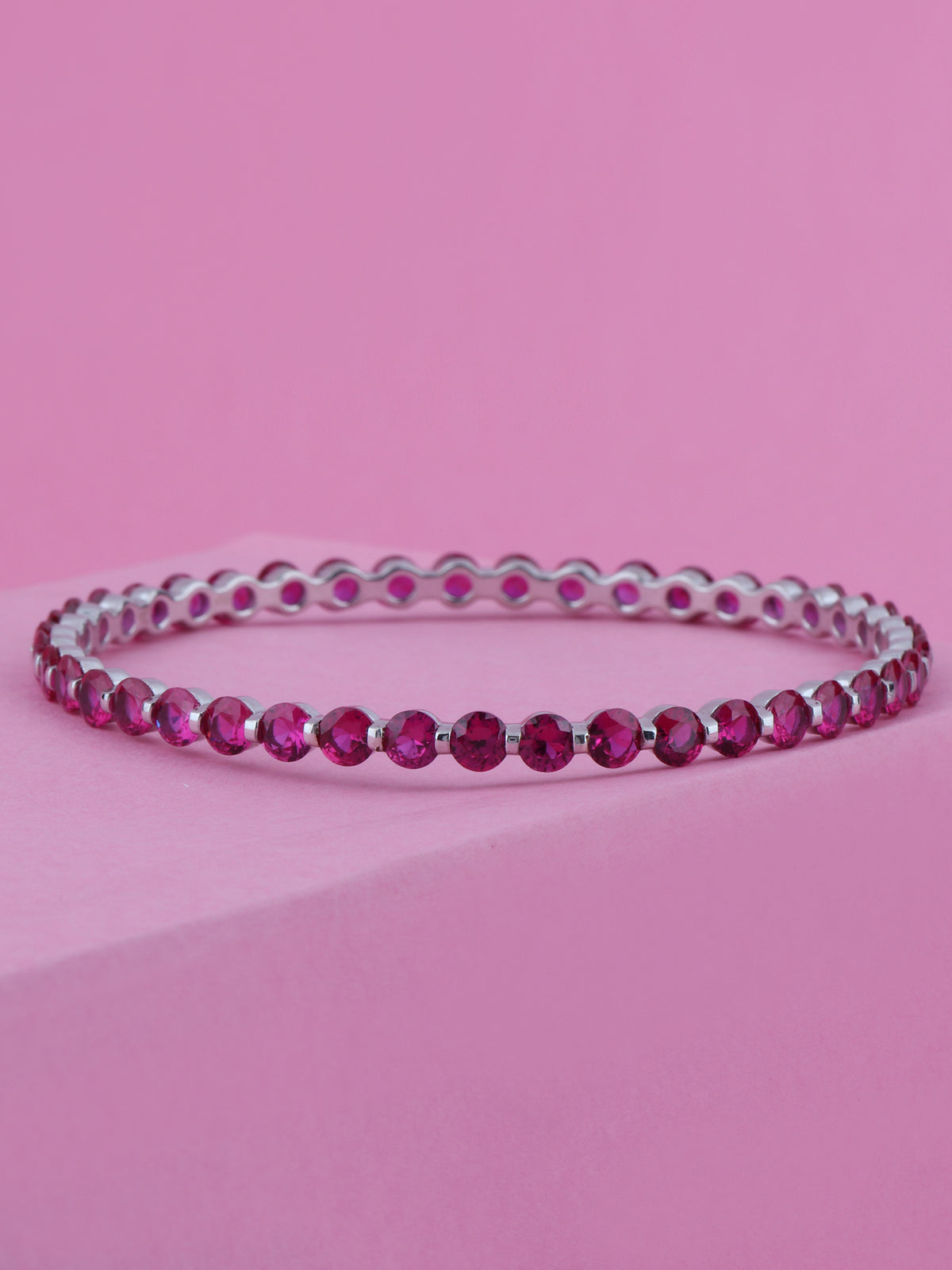 LAB CREATED RUBY BANGLE IN STERLING SILVER