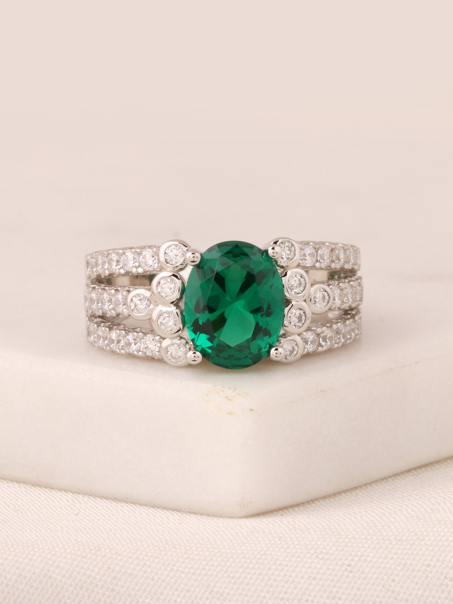 2.5 CARAT OVAL EMERALD SOLITAIRE CLUSTER RING-8