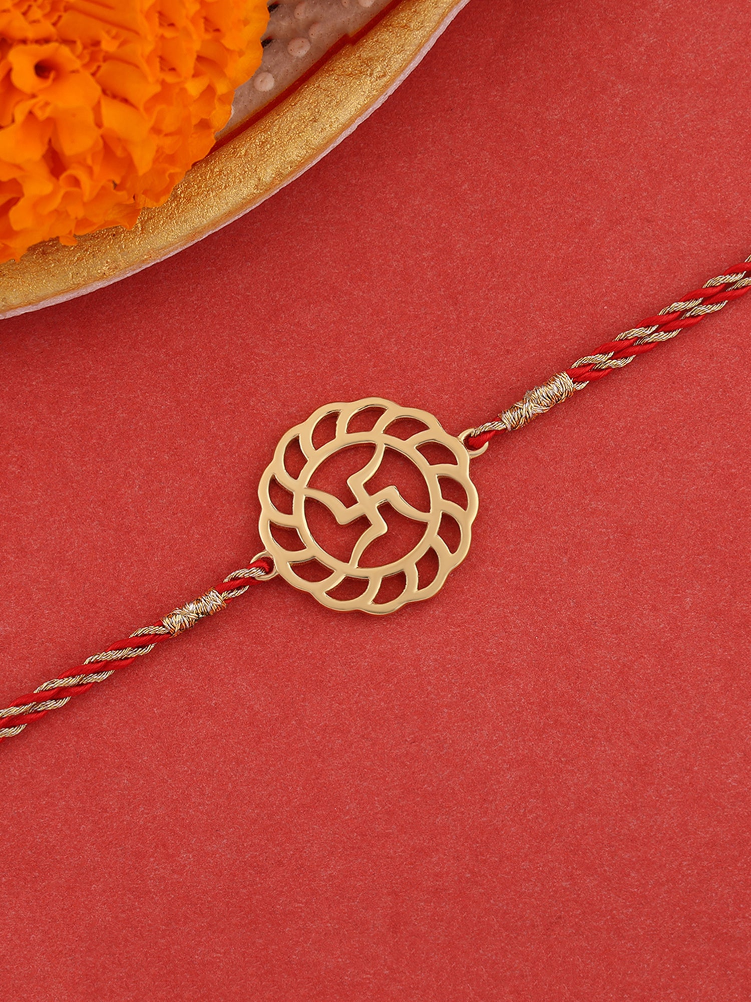 Ornate Swastik Gold  Rakhi For Brother