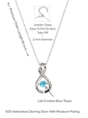 Infinity Design Blue Topaz Dancing Pendant In Pure Silver