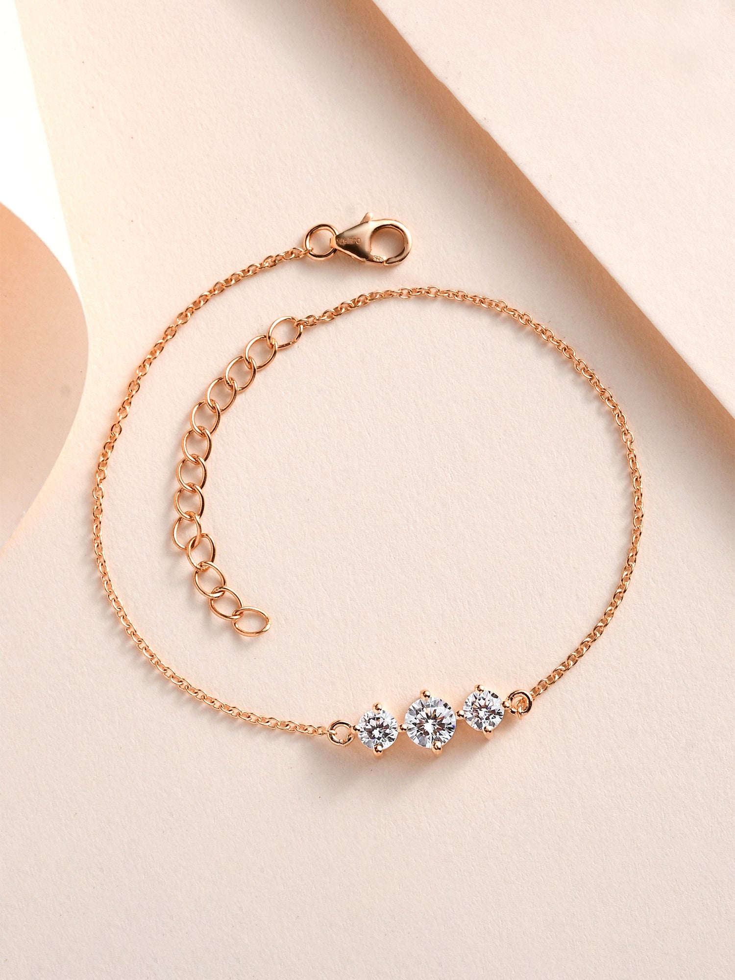 Three Solitaire American Diamond Rose Gold Plated Silver Bracelet