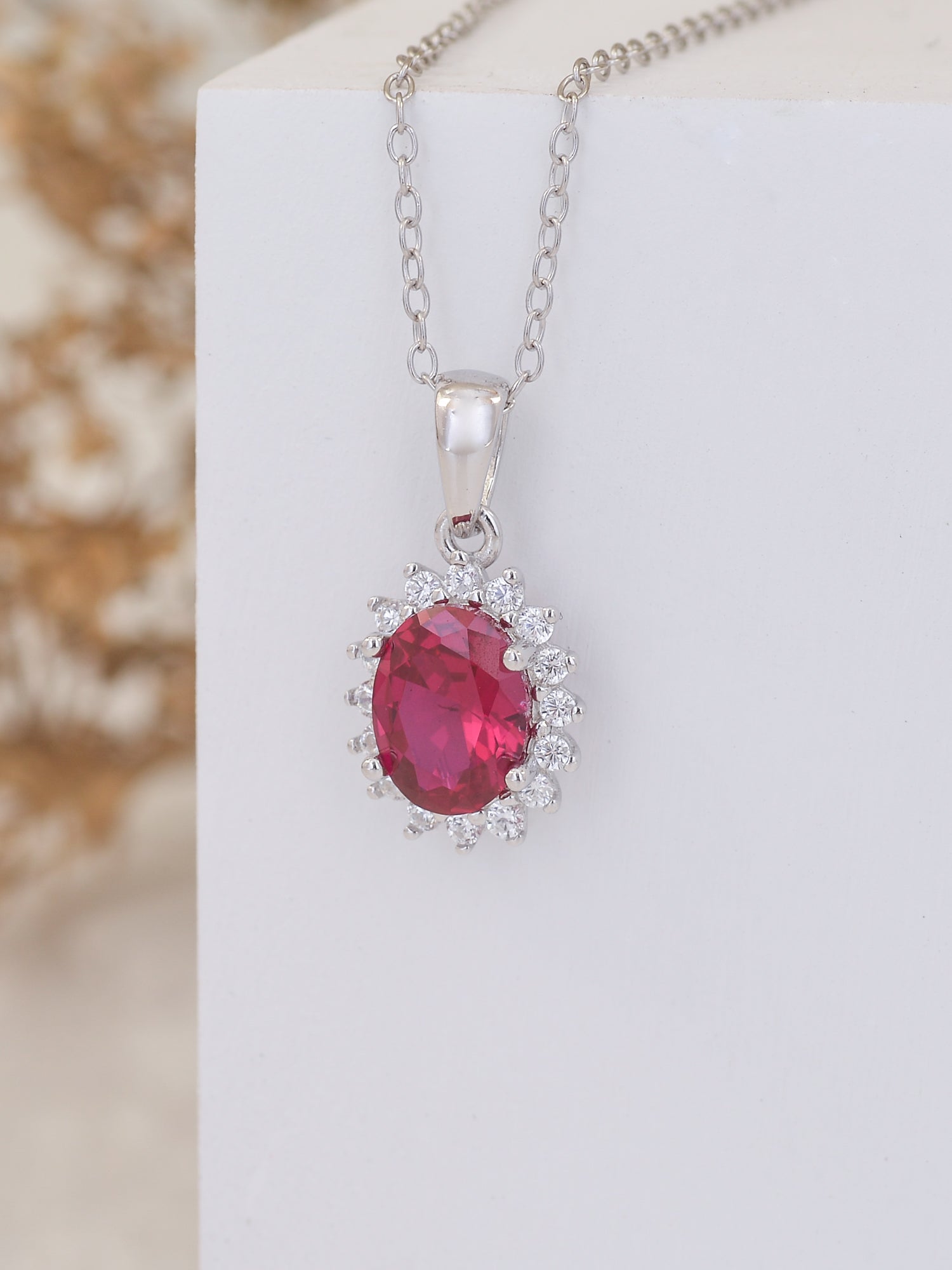 STERLING SILVER RED RUBY HALO OVAL PENDANT