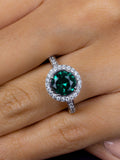 BOUQUET HALO EMERALD SOLITAIRE RING