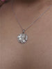 SOLITAIRE WITH A LEAF DESIGN PENDANT WITH CHAIN